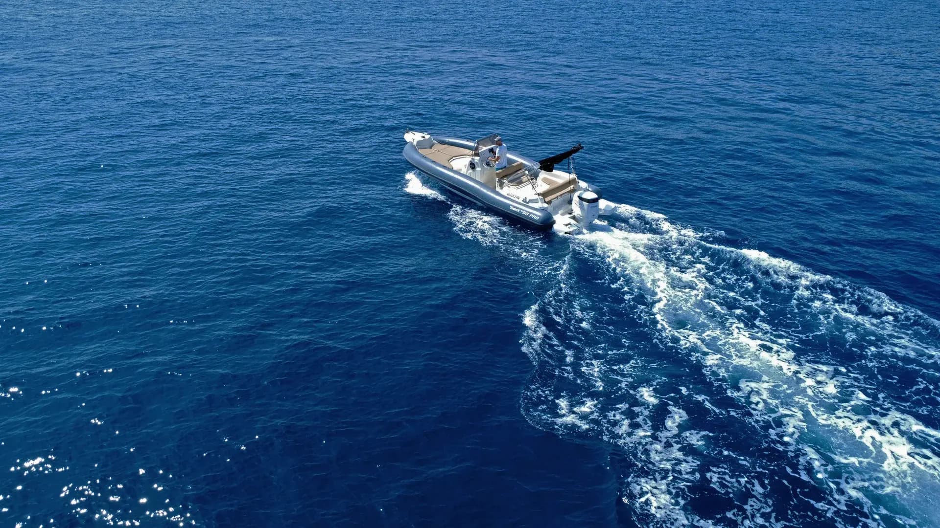Aerial view of a speedboat cruising the Adriatic Sea near Hvar